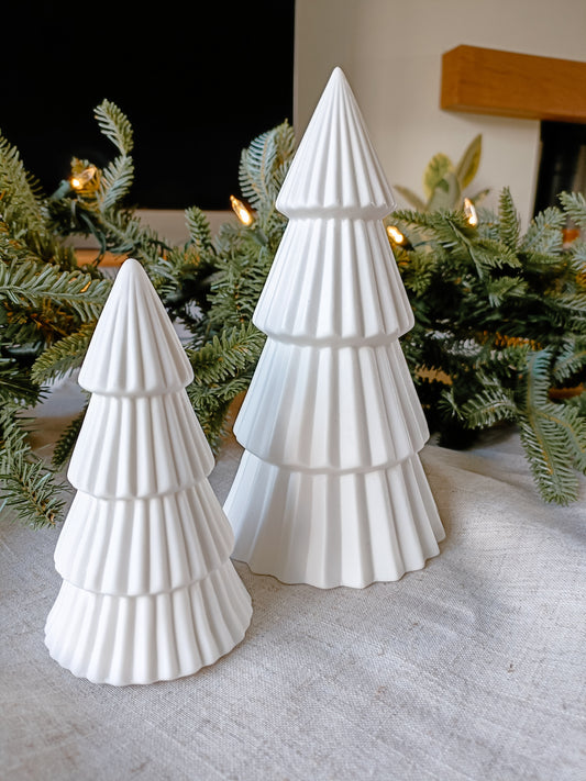 White LED ceramic Christmas trees for mantelpiece or console table. Shown unlit