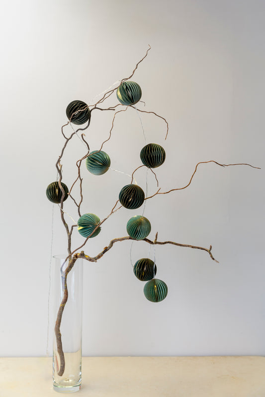 Garland of paper baubles and LED fairy lights with honeycomb boule style baubles. Simply stunning and perfect for Christmas