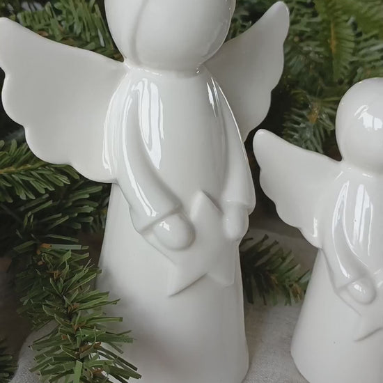 detail video of our pair of white ceramic angel ornaments