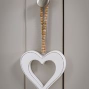 Wooden heart with beaded hoop