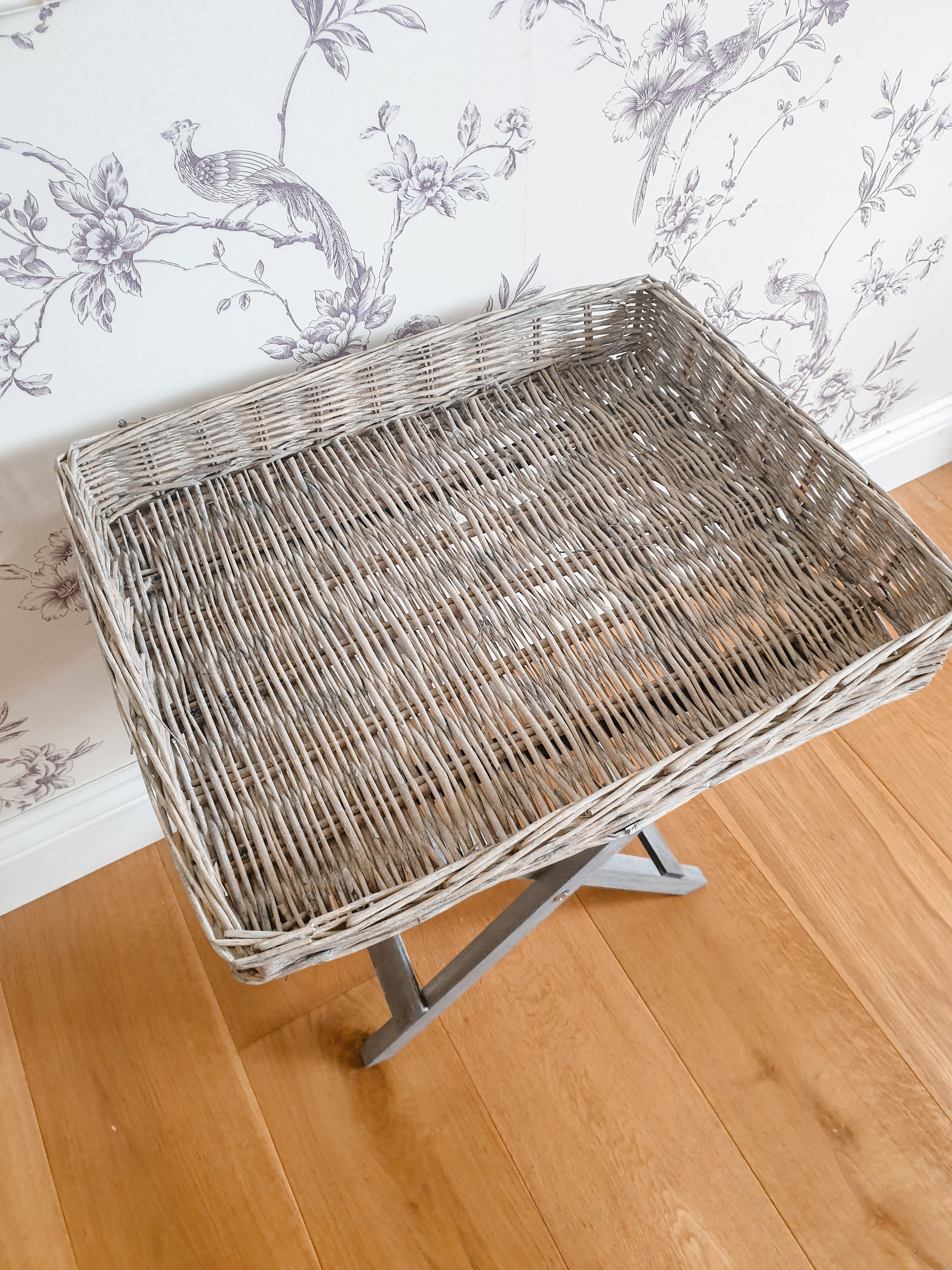 Folding wicker tray table. Perfect home accessory for country & cottage interiors. Butler style tray with folding legs mean this portable tray table is perfect for small sapces, adding to a sofa end or using as a temporary bedside table. Handmade rustic finish in grey.