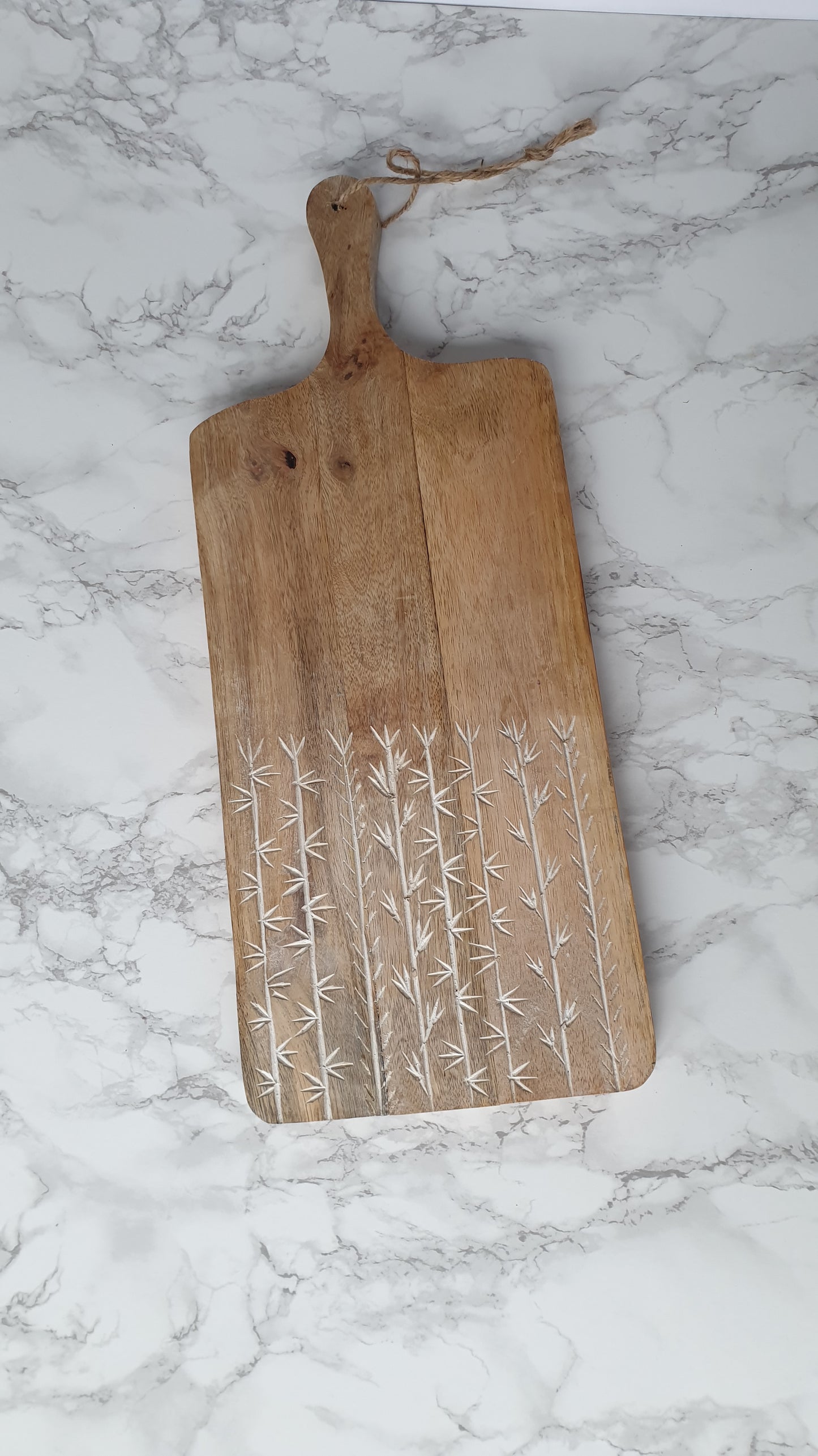 Leaf etched mango wood chopping board