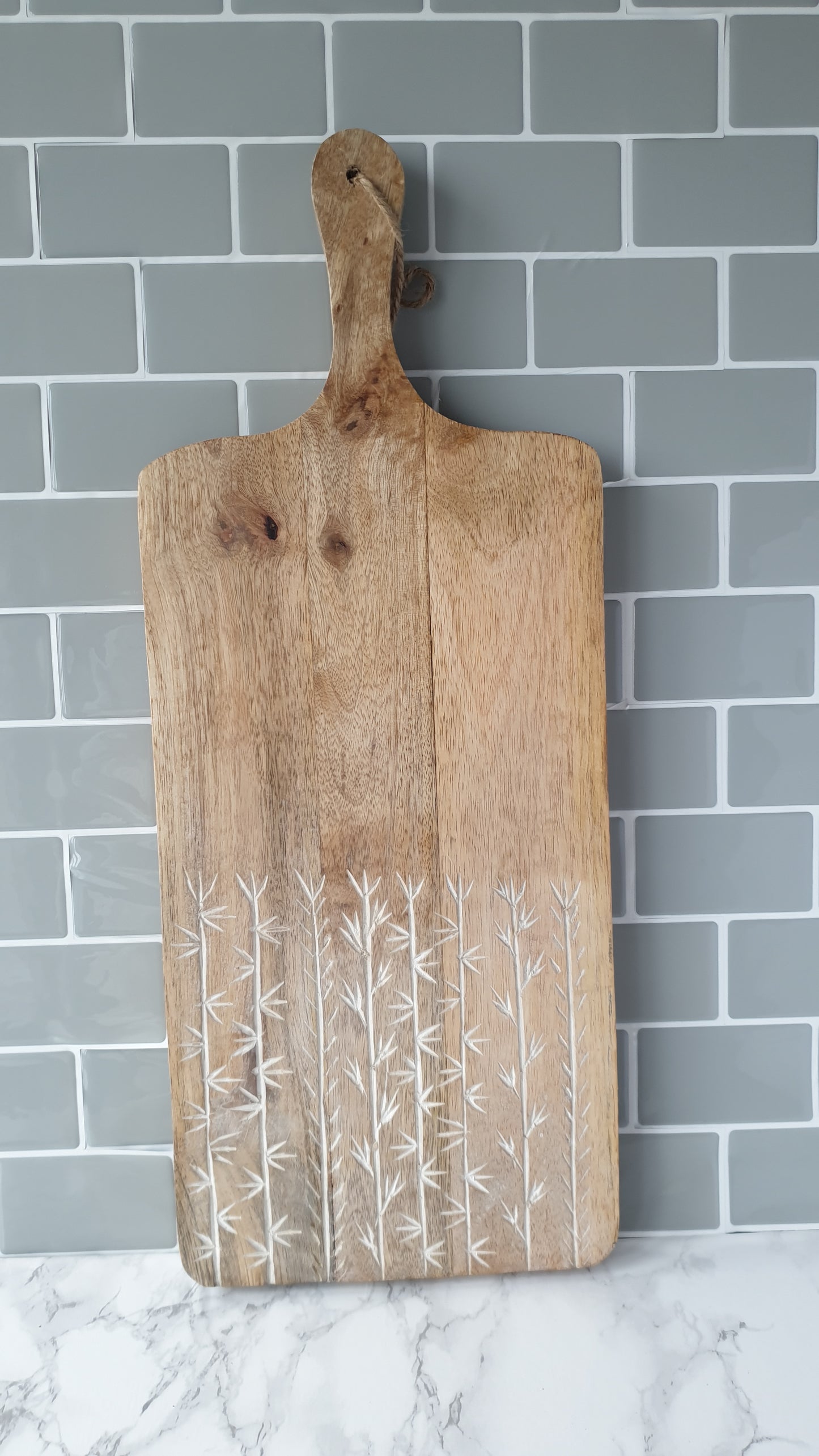 Leaf etched mango wood chopping board