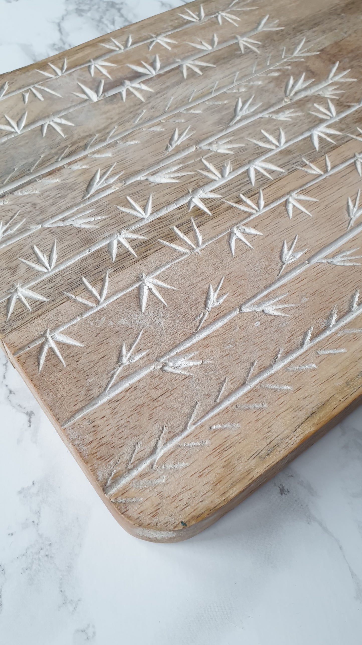 Leaf etched mango wood chopping board