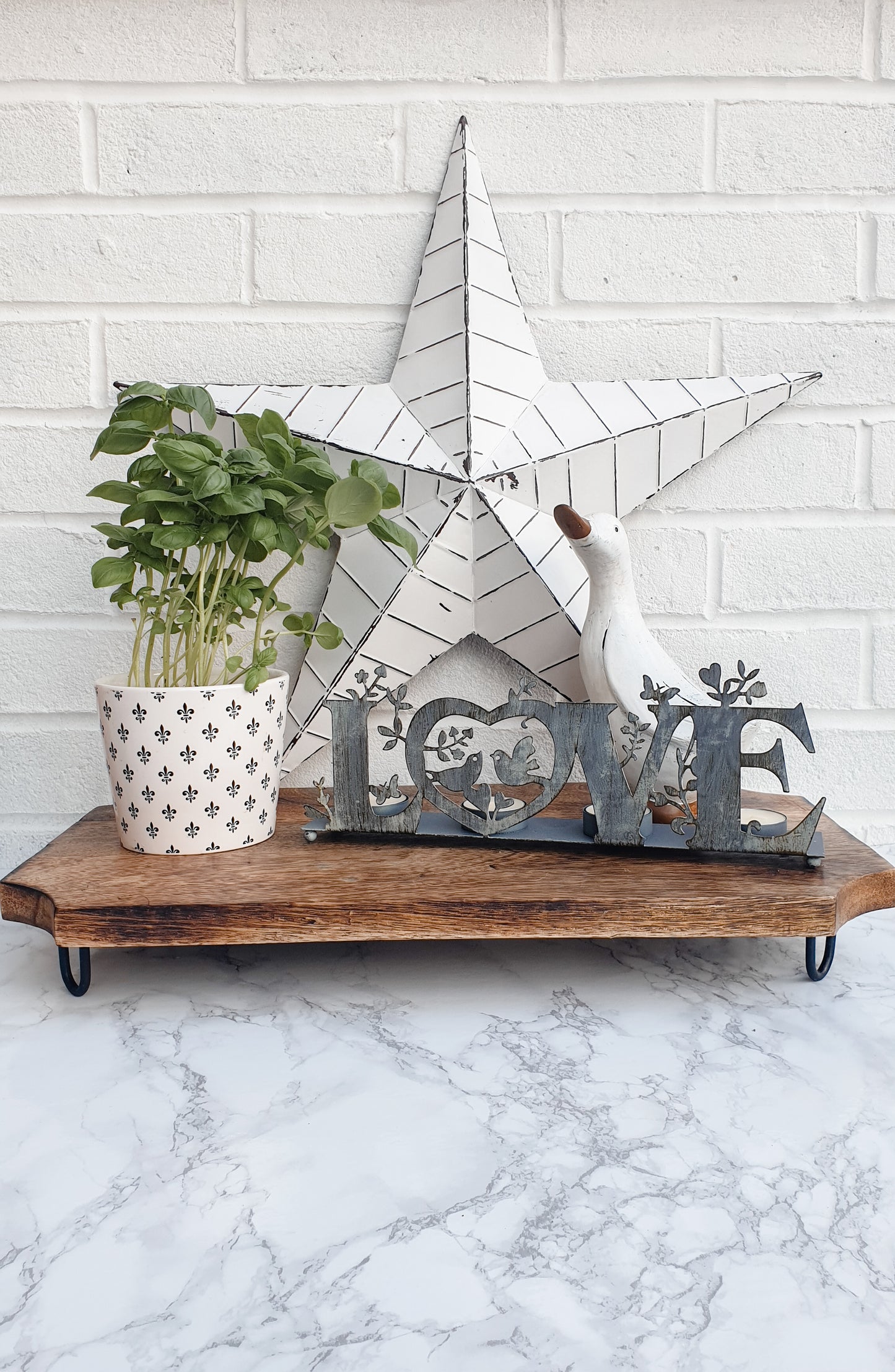 Rustic homeware staple. Wooden board on legs - perfect as a chopping board in the kitchen or as a riser for creating a pretty kitchen display. Perfect serving board for cold cut platter in table centre. From Little Wren Interiors - pretty home accessories, decor and gifts inspired by modern country interiors
