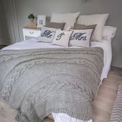 Grey Chunky Cable Knit Throw Blanket on bed