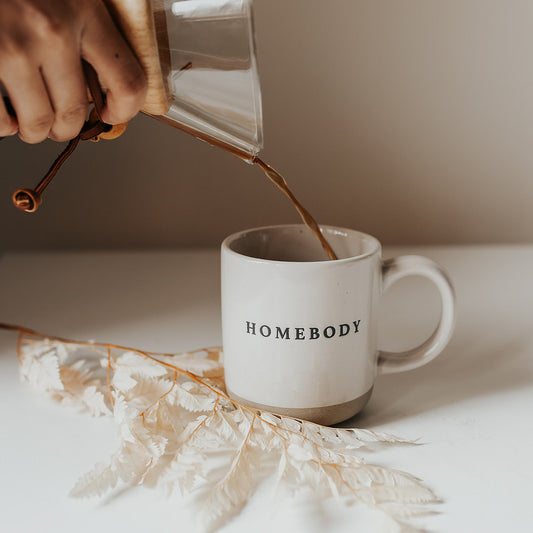 Pour morning coffee into stoneware homebody mug. Perfect gift for home decor and interiors lovers. Embossed homebody lettering on pretty home mug.  Gift for tea drinker, hot choclate lover or coffee addict alike. Homebody mug is a partglazed stoneware mug. Makes an ideal mug gift for home lovers