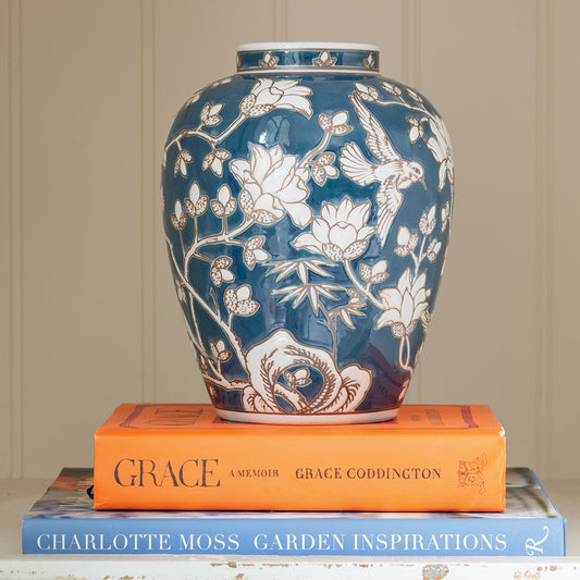 Add a pop of colour to your home decor. Beautifully detailed vase featuring birds and flowers in a glorious deep blue with white detailing. Perfect for console styling or mantel piece styling this vase works through the seasons | Blue and white vase | Vase for flowers | Large Ceramic Vase  | Vase for hydrangeas, flowers, peonies