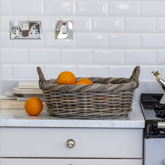 Pretty, practical twisted rim detail kubu basket for handy storage around your home. Pretty bedroom, kitchen, bathroom storage. Basket with handles, a pretty, versatile and practical storage solution. Kubu basket | Kitchen counter basket | Pretty display basket | Rattan Basket | Rustic home accessory | Modern Country