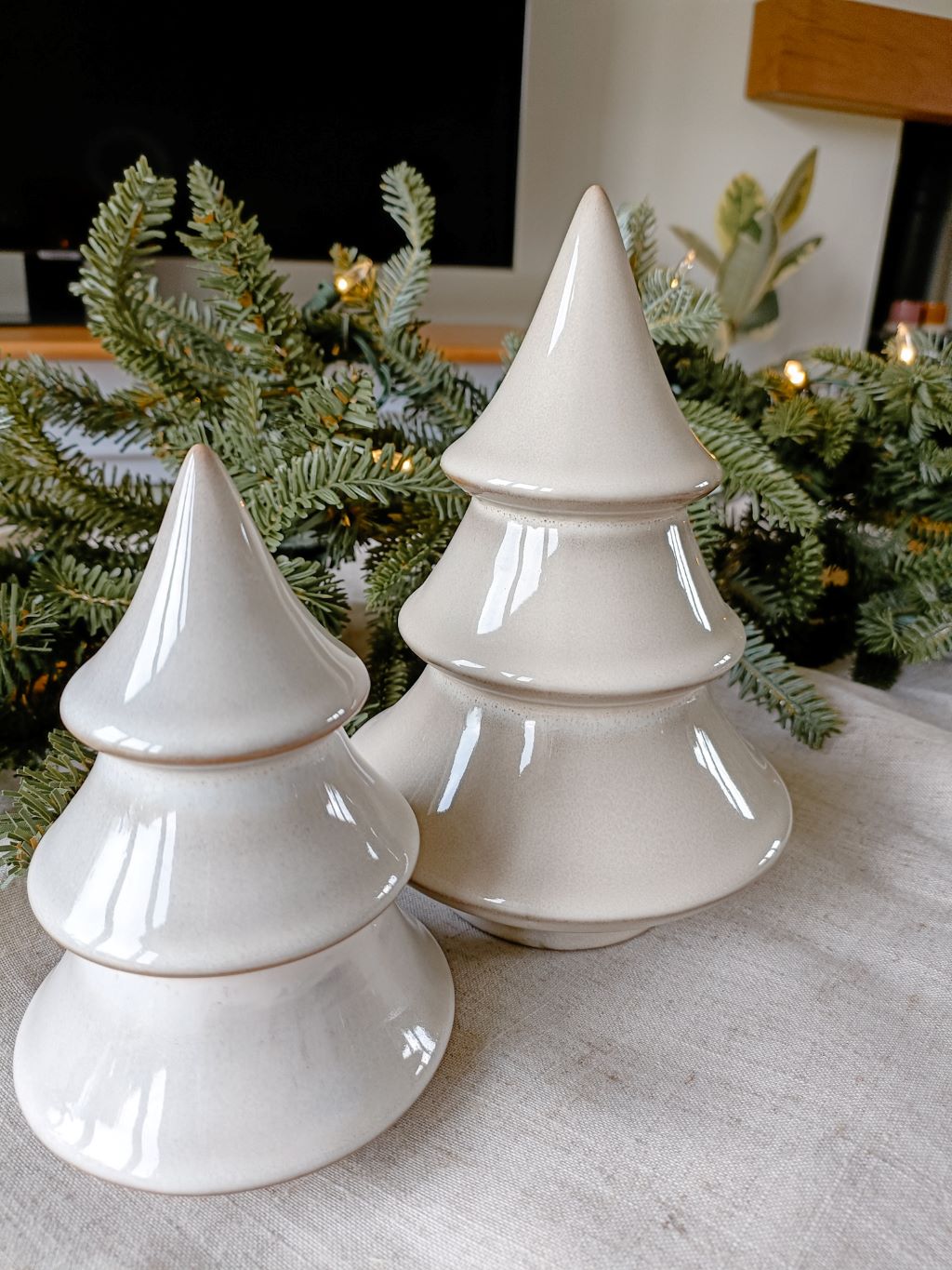 Smaller tree on the front showing our pair of neutral Christmas tree ornaments | Christmas Living Room Decor