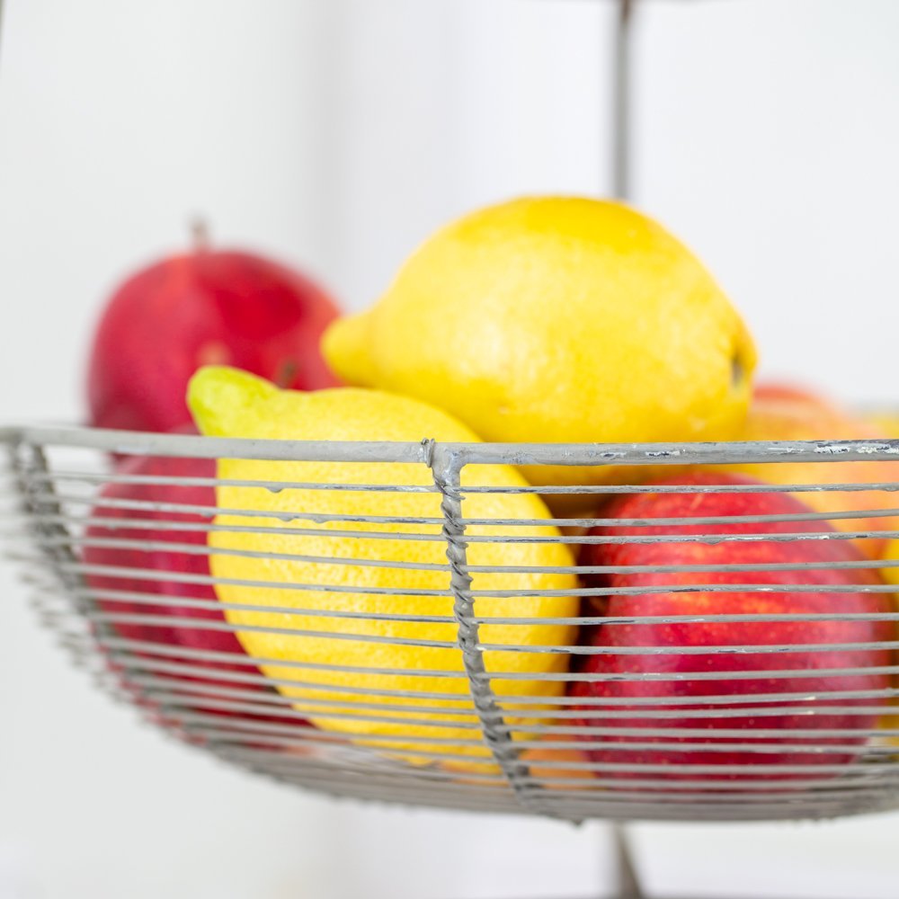 Tiered kitchen storage for fruit and vegetables that also looks pretty on the countertop.  Vetageble storage | Pretty fruit storage | pretty countertop display | kitchen styling