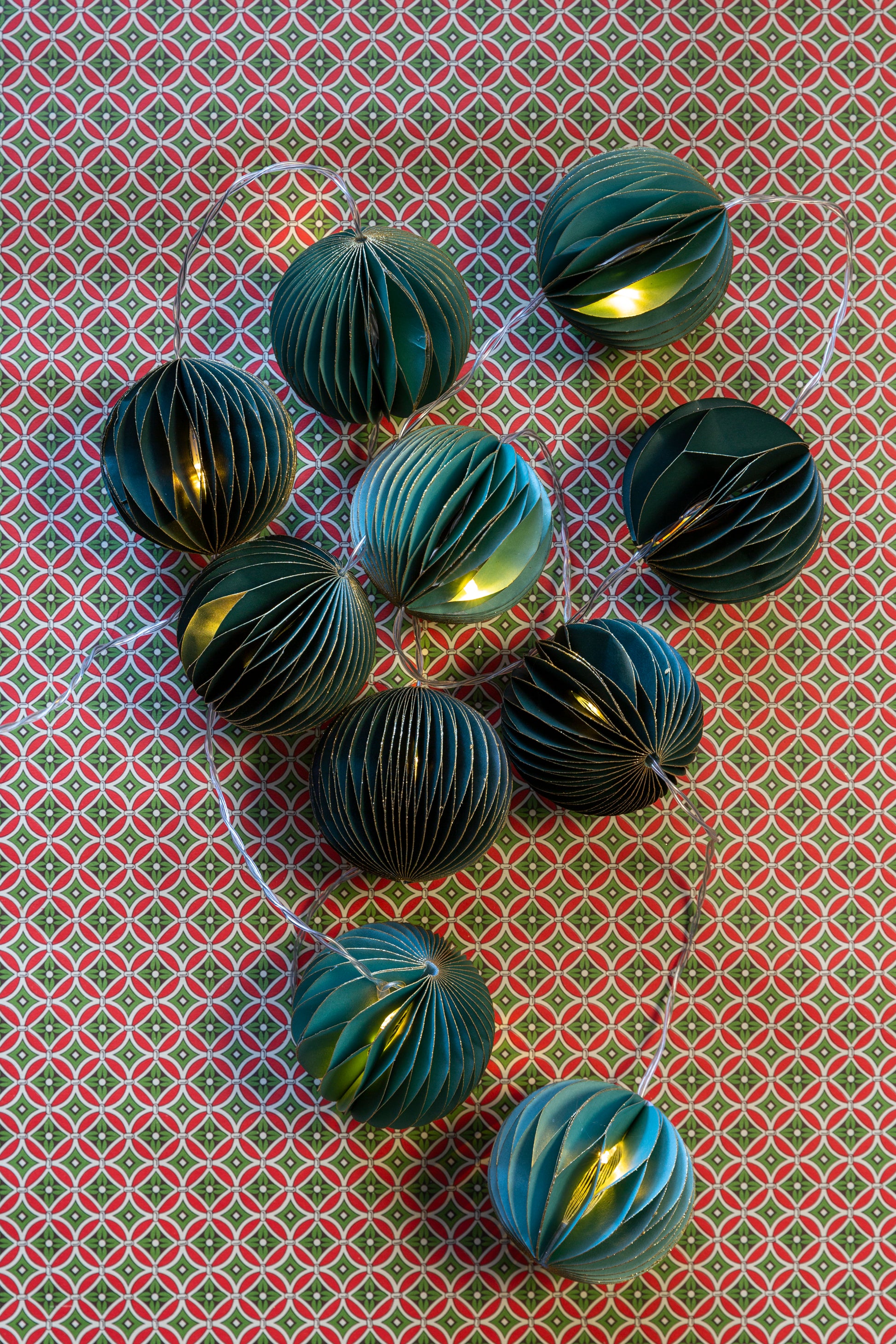 Emerald Green and Mint Green Paper baubles combine to create a beautiful Christmas garland - LED lights are on a timer for ease of use