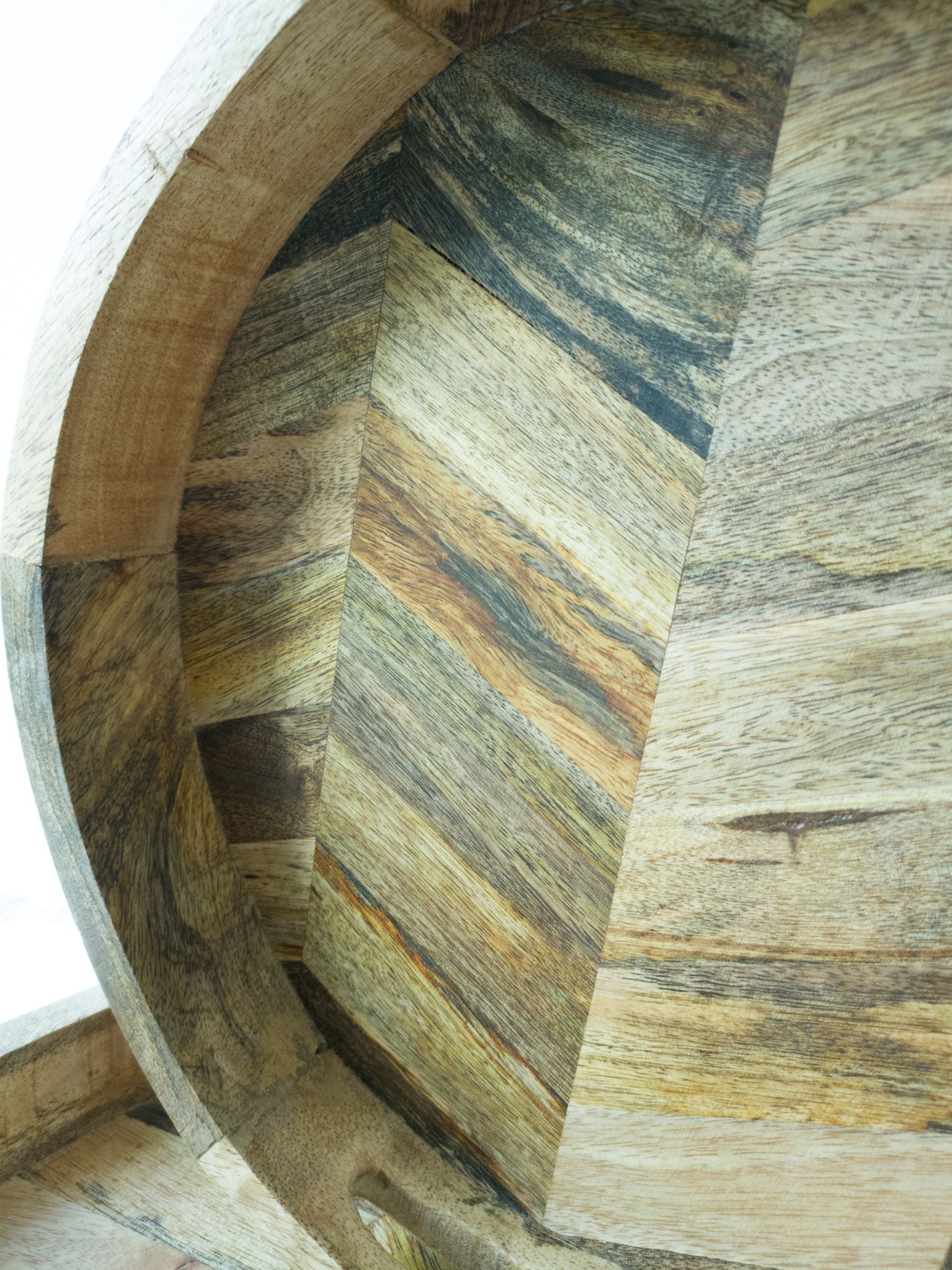 Detail of wood grain on our Round herringbone coffee table trays