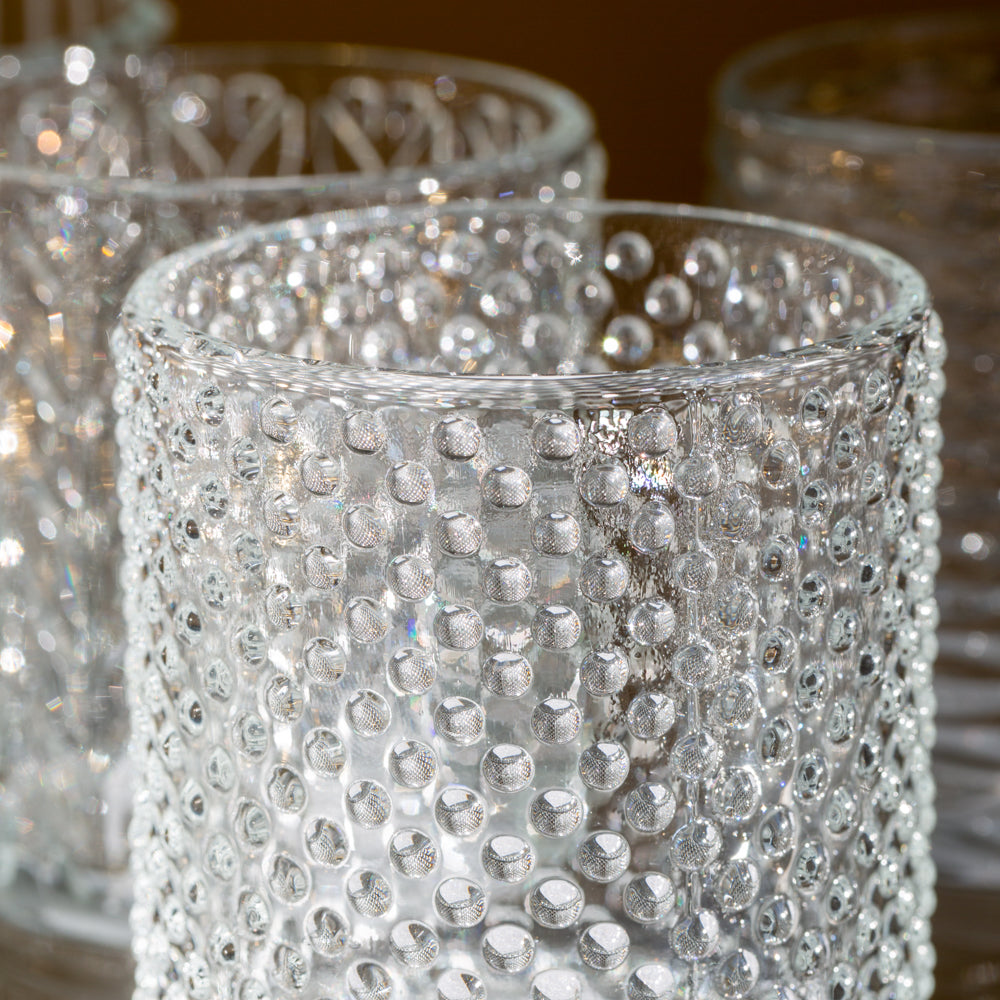 Decorative glass tea light holders with patterns - set of 4 - image shows bubble design in close up.