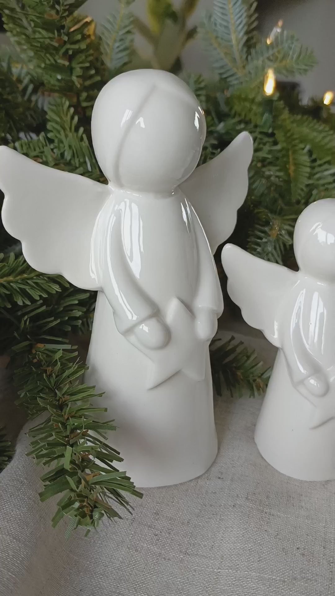 detail video of our pair of white ceramic angel ornaments