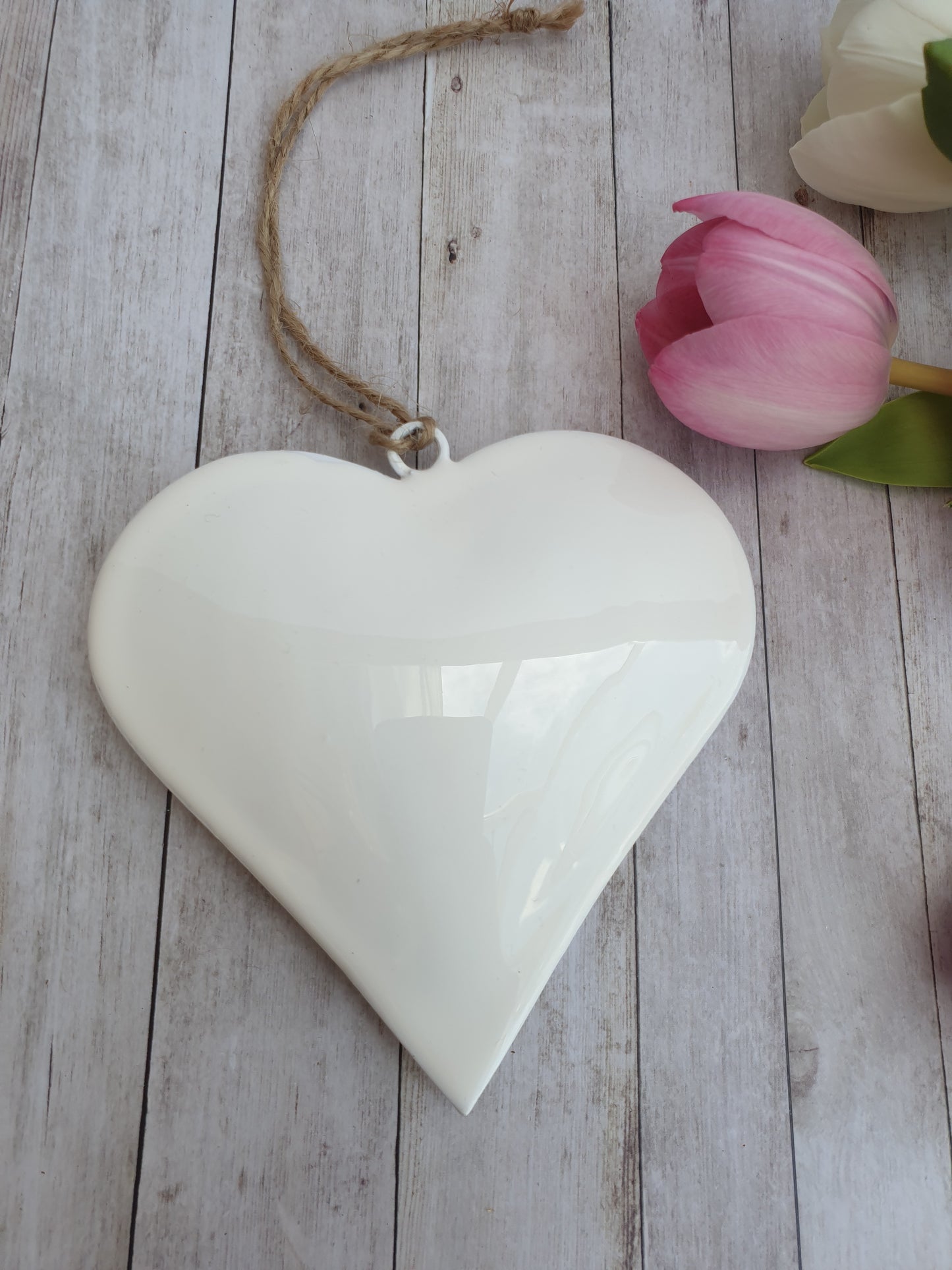 Simple and elegant hanging hearts to fit with modern country, farmhouse and contemporary home decor styles perfectly. The perfect blend between modern and traditional country home styles. Pretty home accessory. Great wall decor, wedding favours, or chair back decorations.