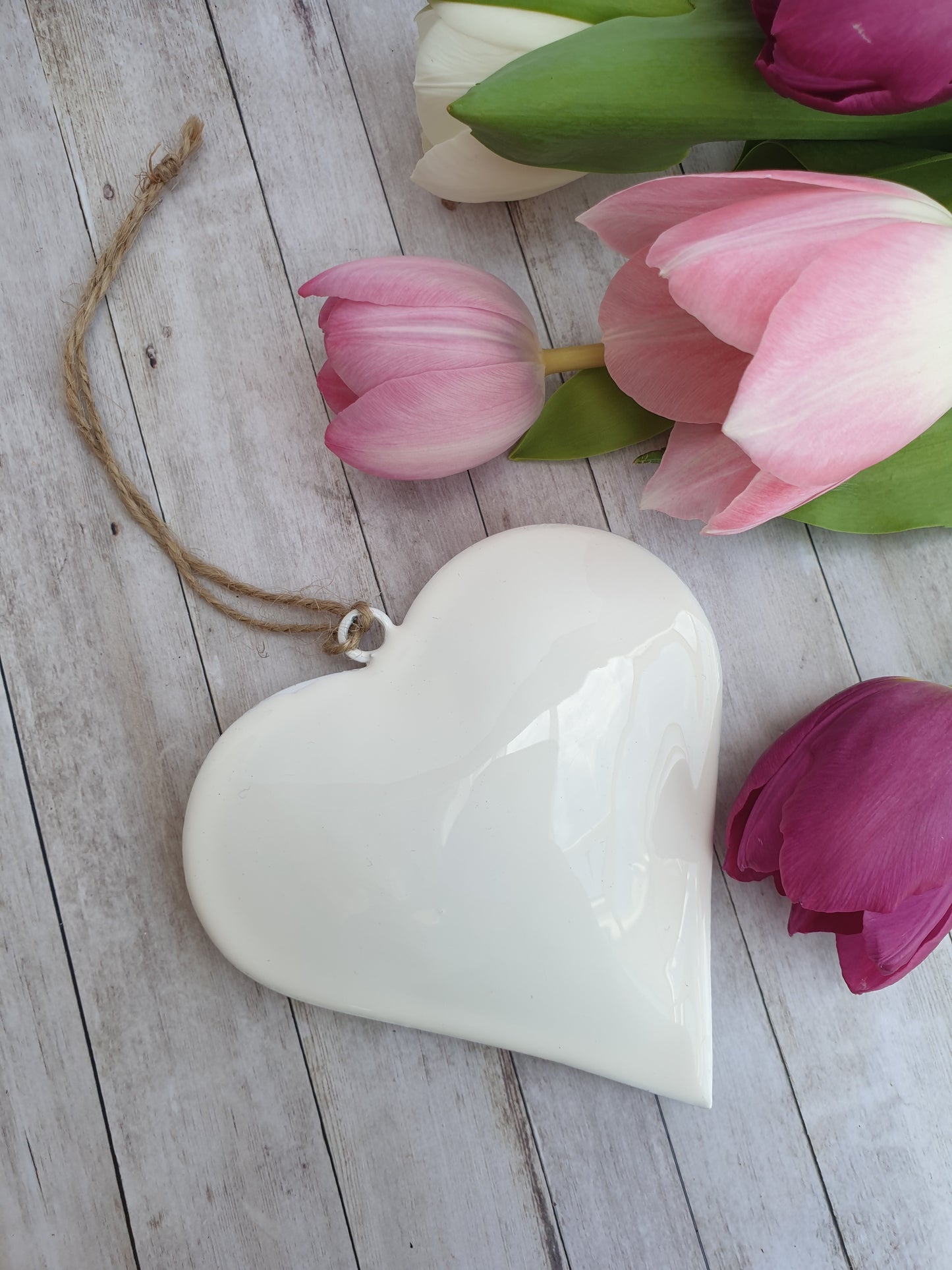 Simple and elegant hanging hearts to fit with modern country, farmhouse and contemporary home decor styles perfectly. The perfect blend between modern and traditional country home styles. Pretty home accessory. Great wall decor, wedding favours, or chair back decorations.