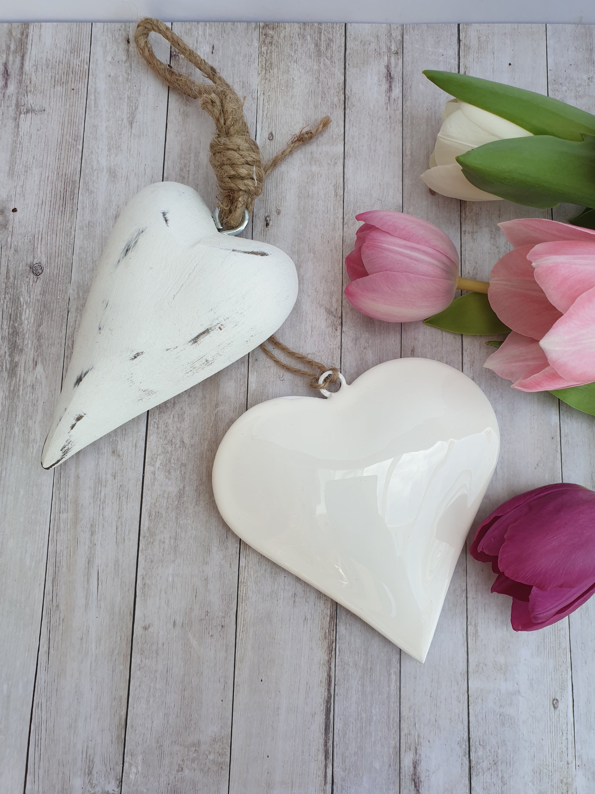 Simple and elegant hanging hearts to fit with modern country, farmhouse and contemporary home decor styles perfectly. The perfect blend between modern and traditional country home styles. Pretty home accessory. Great wall decor, wedding favours, or chair back decorations.