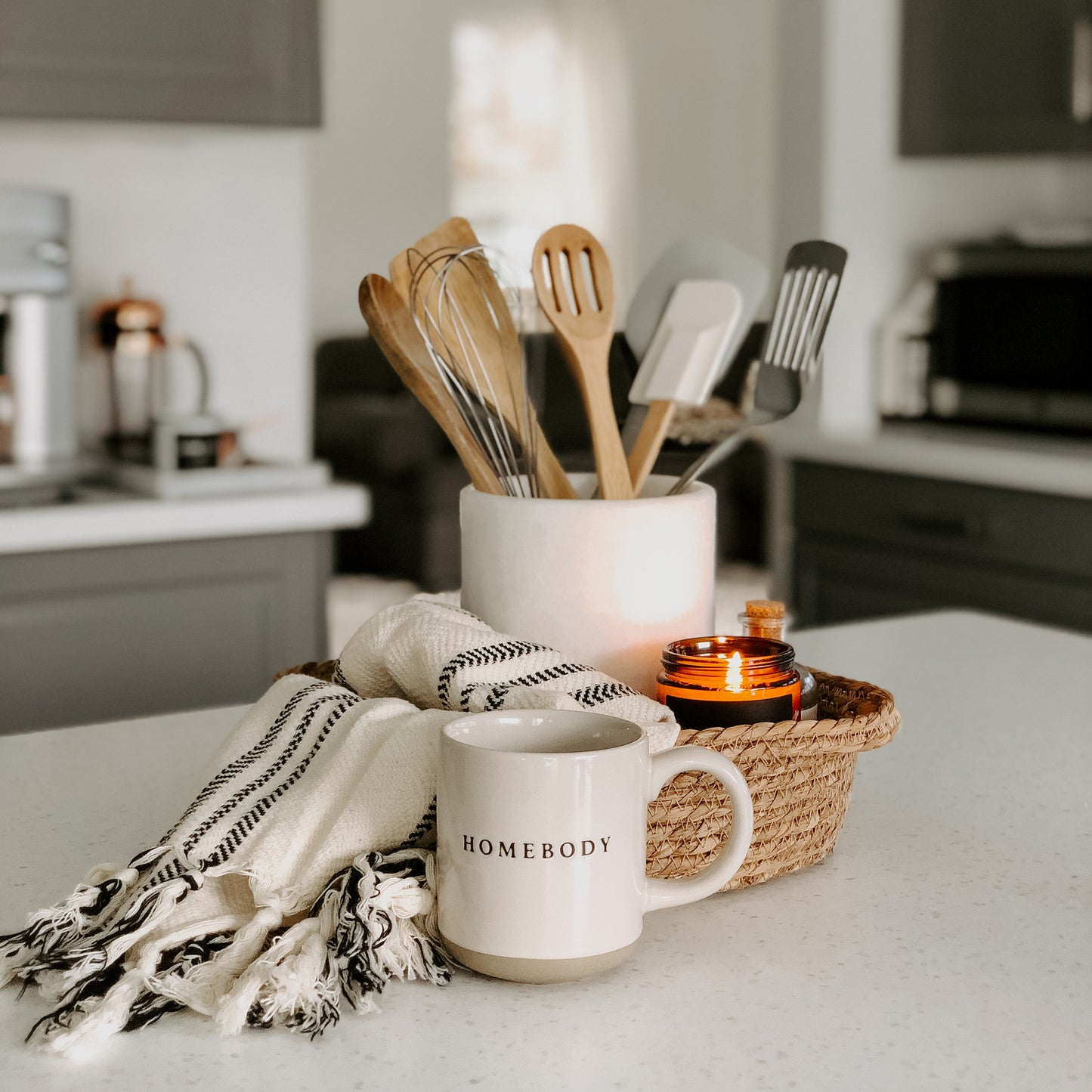 Stoneware homebody mug in kitchen scene.. Perfect gift for home decor and interiors lovers. Embossed homebody lettering on pretty home mug. Gift for tea drinker, hot choclate lover or coffee addict alike. Homebody mug is a partglazed stoneware mug. Makes an ideal mug gift for home lovers
