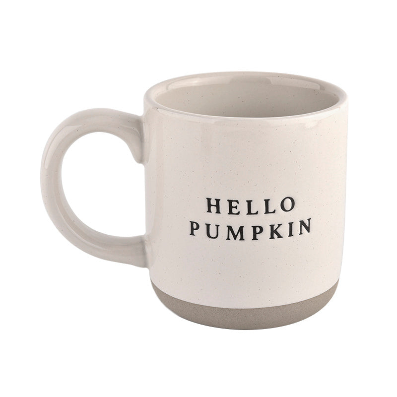 Front view of our Hello Pumpkin autumn mug with stylised lettering on neautral toned mug with partglazed finish
