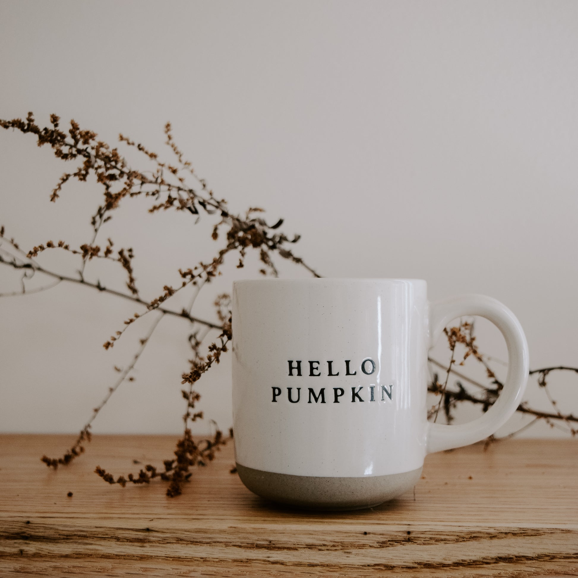 Hello Pumpkin mug with autumnal seasonal foliage. The perfect mug for warming hands this autumn.