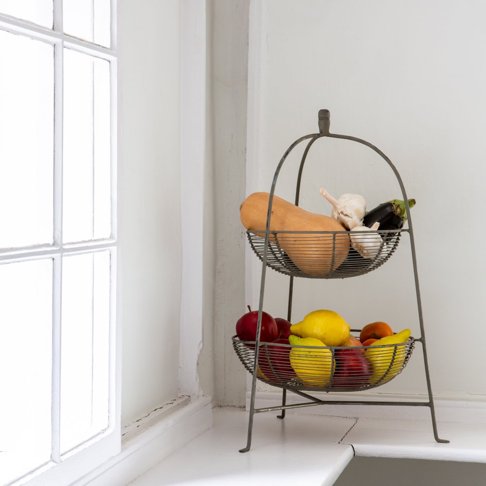 Tiered kitchen storage for fruit and vegetables that also looks pretty on the countertop.  Vetageble storage | Pretty fruit storage | pretty countertop display | kitchen styling