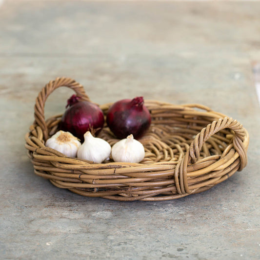 Pretty, practical round kubu rattan tray to create beautiful displays around your home. Pretty bedroom, kitchen, bathroom styling. Basket tray with handles a pretty and practical display solution. Kubu basket | Kitchen counter tray | Pretty display basket | Rattan Basket | Rustic home accessory | Modern Country
